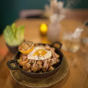 Tofu sizzling tofu, pepper relish, farm egg,