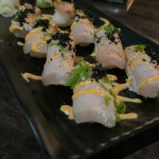 a plate of sushi on a table