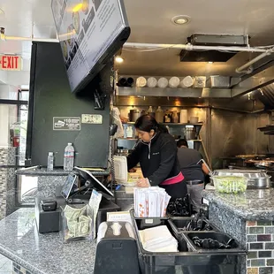 Inside of Kaz's. The worker behind the counter, for some reason, was deliberately ignoring all incoming phone calls.