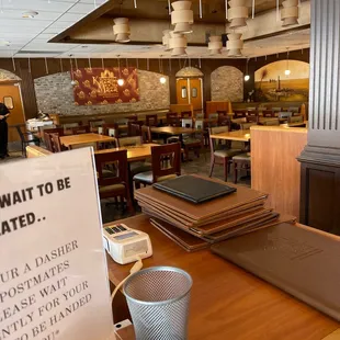a restaurant with tables and chairs