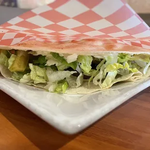 Burger wrapped in pita bread