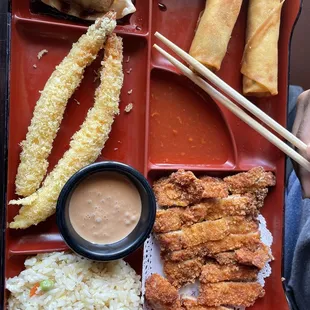 Katso bento box with shrimp, dumplings and spring rolls... fried rice