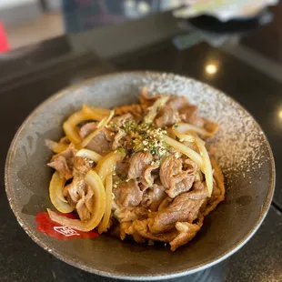 a close up of a bowl of ramen