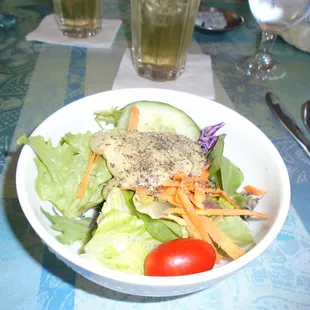 side salad that comes with dinners (server came along and added the pepper)