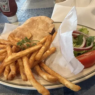 Kazan Burger Special, very good, delicious. Naan with grilled lamb burger well cooked. I love naan, thanks!