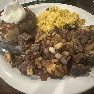 Beef tips w/ fully loaded baked potato... yum!