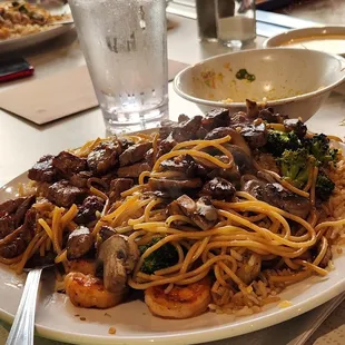 This is the Filet, Jumbo Shrimp and Chicken which comes with soup, salad mushrooms, zucchini , fried rice and noodles for $45 dollars.