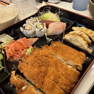 Bento with sashimi and tonkatsu