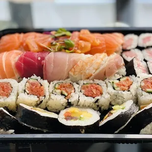 Orange Blossom Roll, Tuna Roll, Rainbow Roll, Spicy Tuna Roll (was supposed to be a hand roll), Futomaki Roll