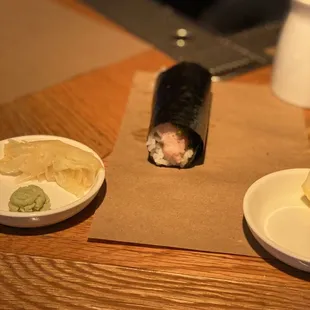 a piece of sushi on a plate