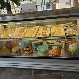 a display of cakes and pastries
