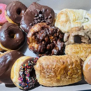 a variety of doughnuts in a box