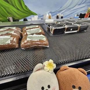 Spam musubi are next to the kulolo...