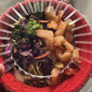 Shrimp bowl with rice and a side salad