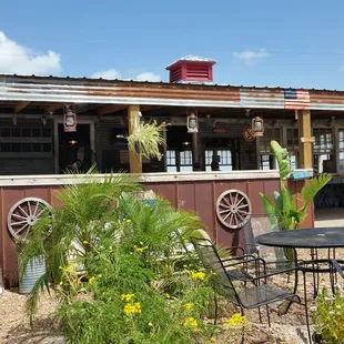 a table and chairs outside