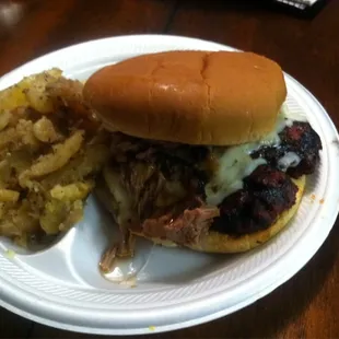 Smoked cheeseburger with brisket and garlic wedges. Amazing flavor