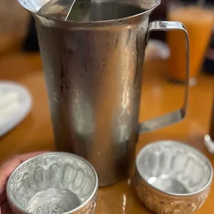 So clever. Reminds me of Thailand drinking from the rain water with the little silver water bowls.
