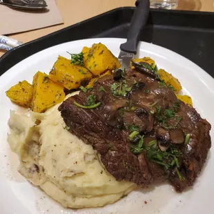 Steak dinner with mashed potatoes and roasted squash. Very good!!