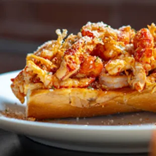 Our version of the traditional Louisiana style shrimp Po-boy served on French bread. Served with lettuce, tomato, and spicy mayo.