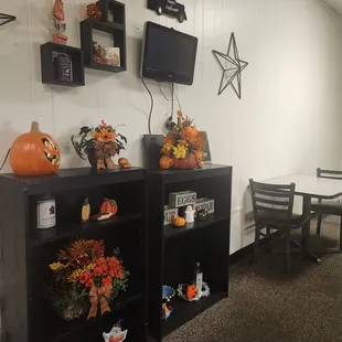 Halloween decorations inside and small table to eat
