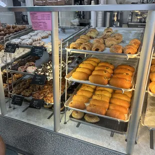 a display case full of doughnuts
