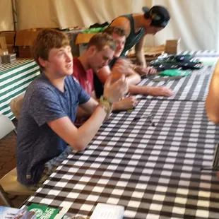 The band MOXIE signing autographs after their show.