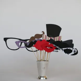 Glasses &amp; 'Staches enhance the photobooth fun!