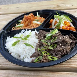 Dosirak: Korean Lunch Box; Bulgogi, Rice, Tteokbokki, Bibim Guksu.