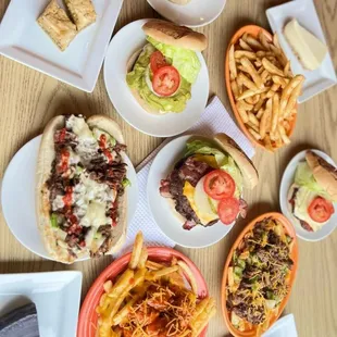 a variety of burgers and fries