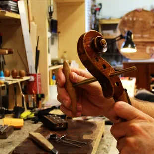 Scroll work on a violin.