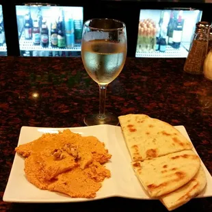 Tulumaki with pita wedges. Great spread.