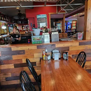 a wooden table and chairs