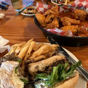 Mild chicken wings that should have been extra crispy and Steak and Cheese sub with jalapenos that didn&apos;t have jalapenos
