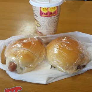 Large milk tea, hot dog bun and bbq pork bun.