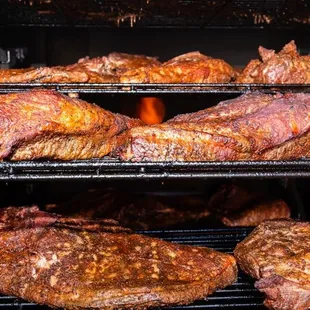 ows steaks cooking in an oven