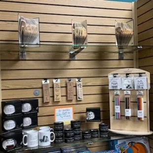Flypaper mugs, candles, and bookmarks