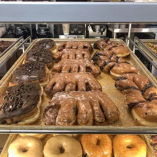 Giant chocolate chip donut, Bearclaw, and tiger tail twist