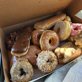 a variety of donuts in a box