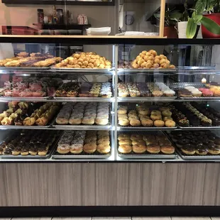 a display case full of donuts