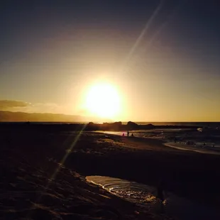 Sunset on the beach 20 feet from your cottage