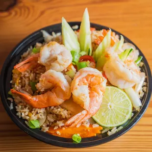 a bowl of shrimp and rice