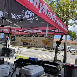 a tent set up on the side of the road