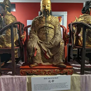 This sculpture is made entirely of wood and that is real human hair.