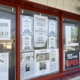 a window with a sign saying thank you