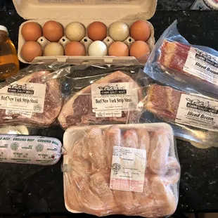 Honey, Farm fresh eggs, New York Strips, Bacon, Ground Beef, and some Chicken Wings.