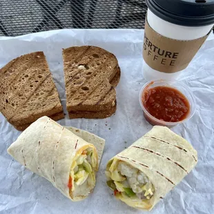 a sandwich and a cup of coffee