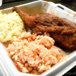 Half chicken with slaw and potato salad