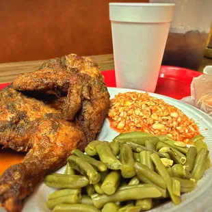 Hot sauce dipped BBQ half bird with hot slaw and beans. The BBQ national anthem.