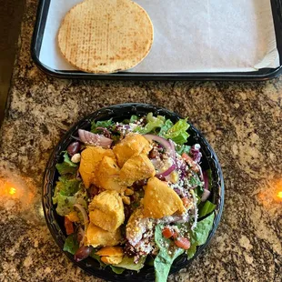 Greek salad with chicken kebab