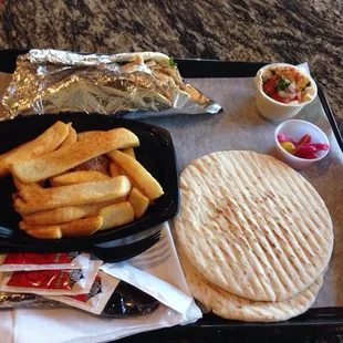 Chicken shewarma, steak fries and 4oz house made humus.